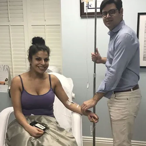 Woman getting IV Therapy from Dr. Zahedi